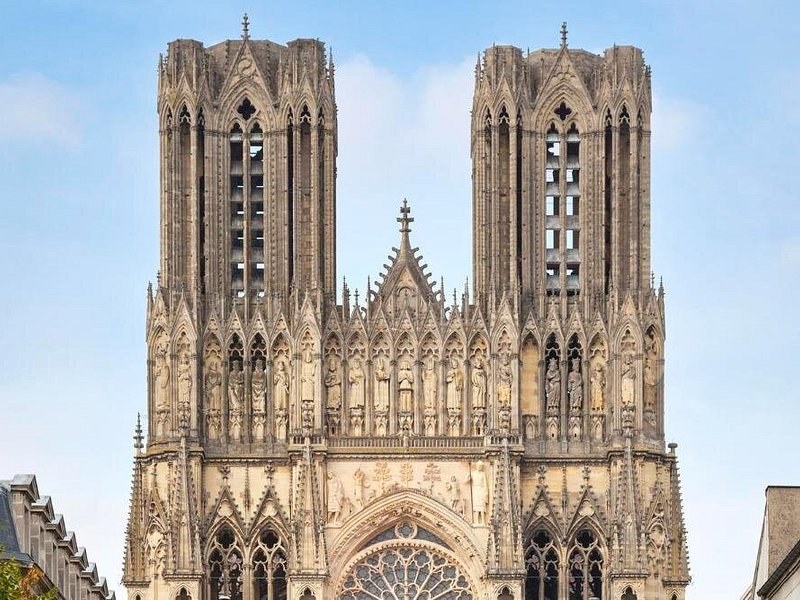 The two flat-topped towers of Reims Cathedral above the gallery of kings